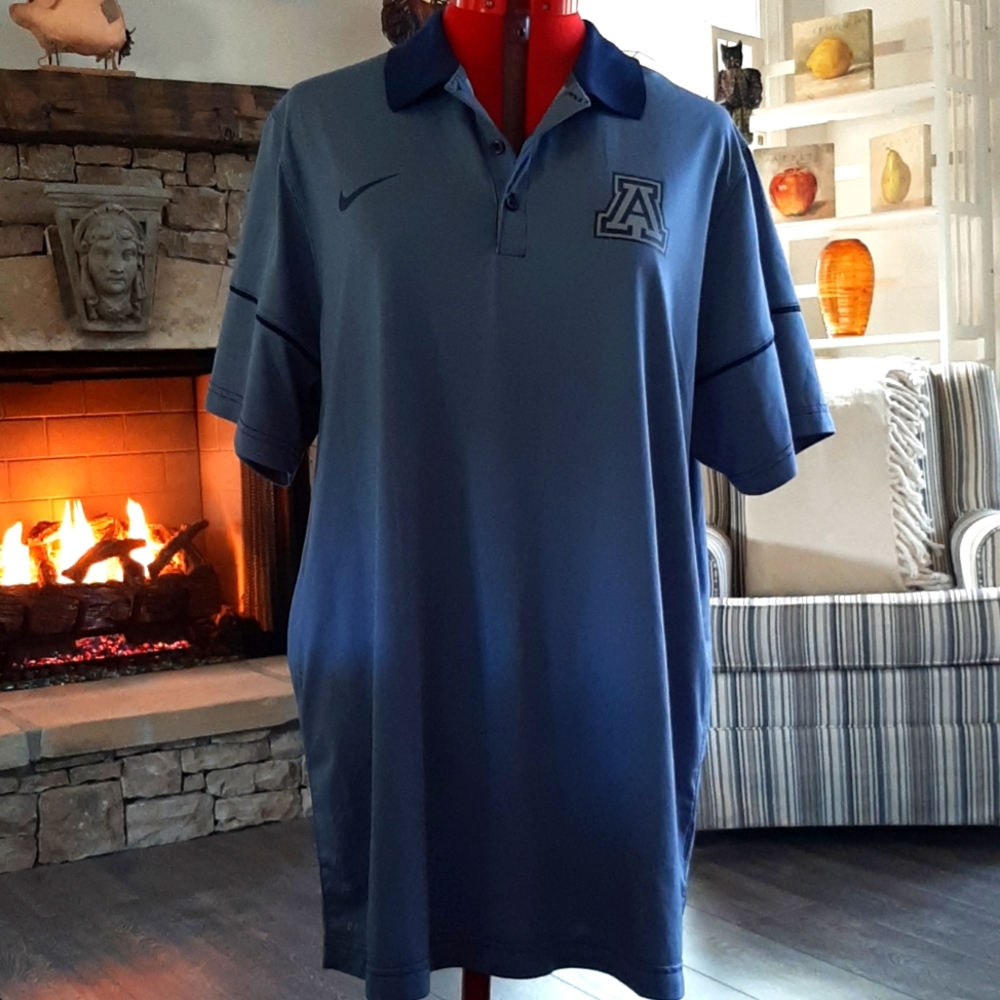 Nike Dri Fit size XL navy blue shirt.